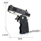 1PC Mini Keychain Gun Rubber Band Gun Toy Gun Shooting Pistol Alloy Kid Outdoor Activities Party Game Birthday Gift for Children